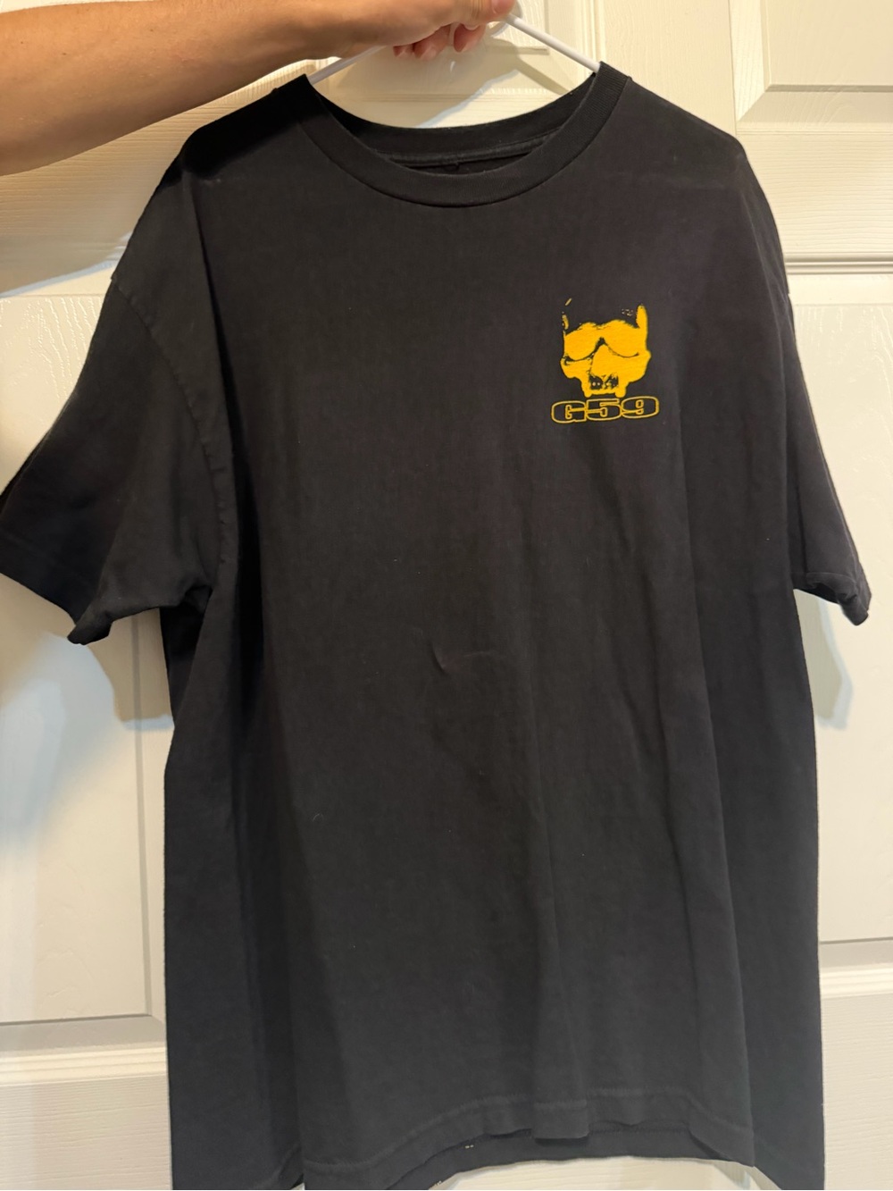 Black Short Sleeve Tee with Yellow Skull Graphic